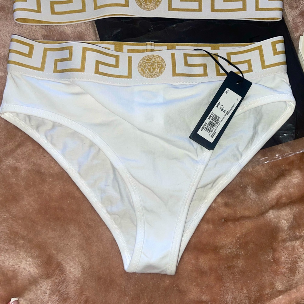 A beautiful set of Versace sport bra & Versace bottom never worn. With tags.
